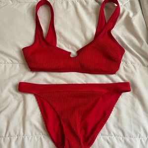 red two piece bathing suit from Hollister the top is a size S and bottoms are M